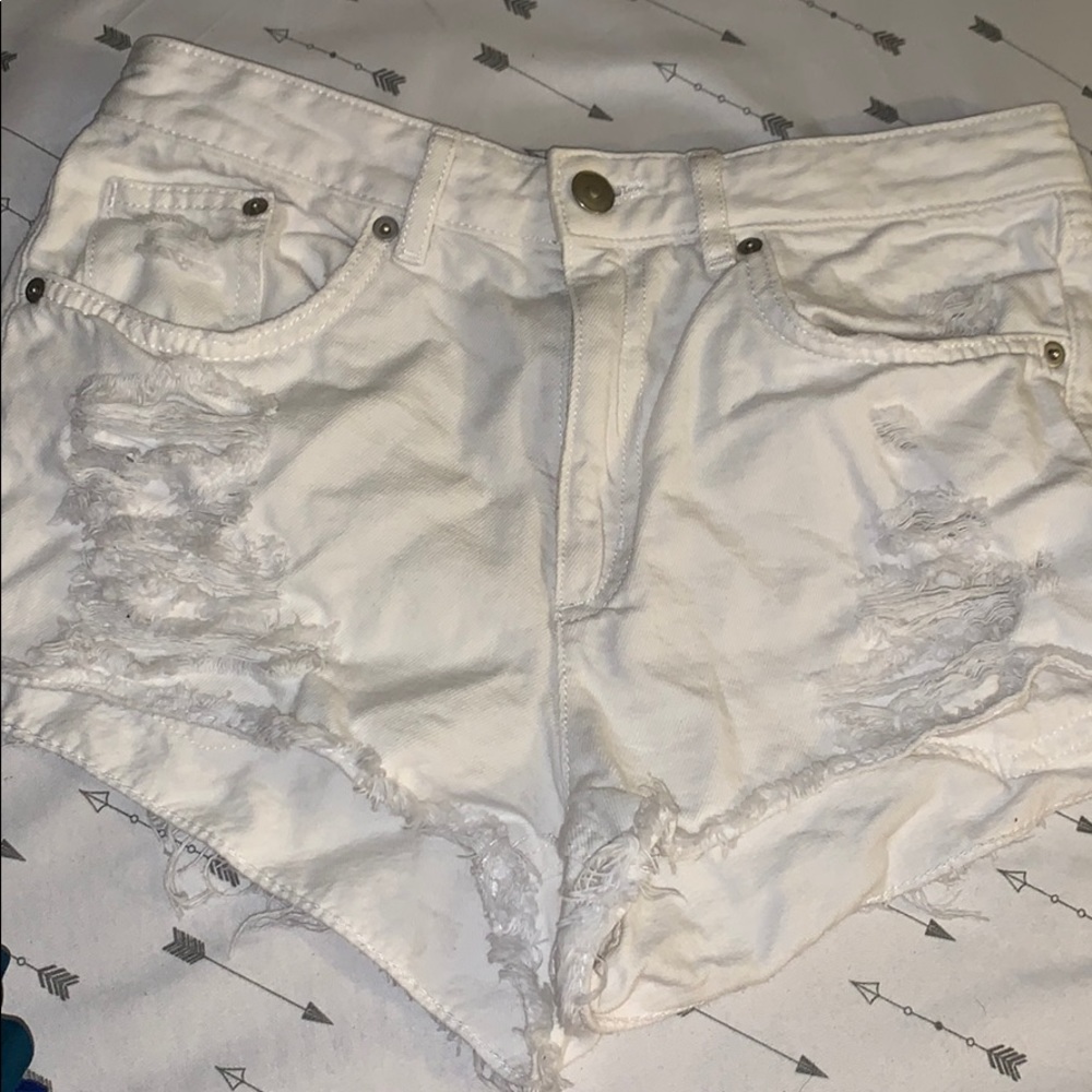 White distressed shorts